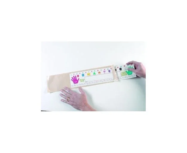 A person holding a white board with colorful paint on it.