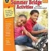 Children smiling on a colorful workbook cover
