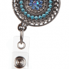 A badge holder with blue stones on it.