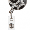 A black and white badge holder with clear crystals.