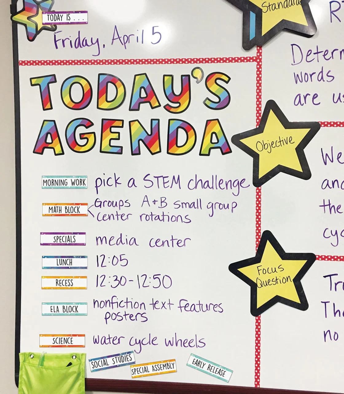 A white board with a yellow star on it