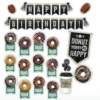 A bunch of donuts are on display with the words " happy birthday ".