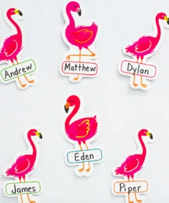 A bunch of pink flamingos with names on them