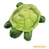 A stuffed turtle is sitting on the ground.