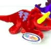 A red stuffed animal with horns and a yellow tail.