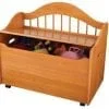 A wooden toy box with wheels and a lid.