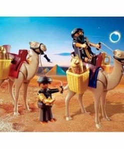 A group of people riding on the backs of camel.