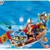A toy boat with two people in it