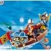 A toy boat with two people in it