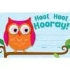 A red owl sitting on top of a branch.
