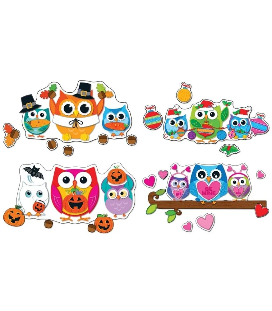 A group of owls that are sitting on the ground.
