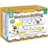 A box of sentence building with pictures on it.