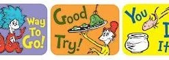 Four Dr. Seuss stickers with the words good go try.