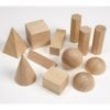 A group of wooden blocks and balls on top of a table.