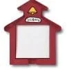 A red school house shaped note holder with the name of school on it.