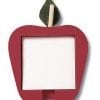 A red apple shaped picture frame with a leaf on top.