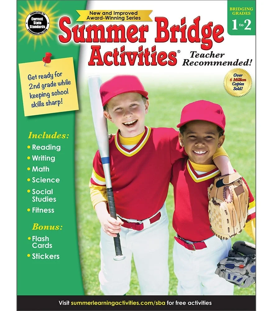 Smiling kids wearing red baseball uniforms