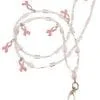 A pink beaded lanyard with breast cancer awareness ribbons.
