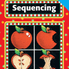 A book cover with four pictures of apples.