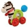 A zebra toy is on the ground.