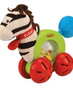 A zebra toy is on the ground.