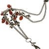 A chain with beads and stones attached to it.