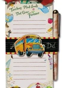 A note pad with a pen and sticker on it.