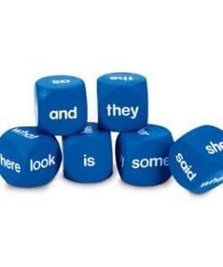 A set of six dice with words written on them.
