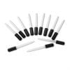A group of black and white pens sitting on top of each other.