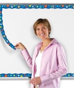 A woman holding onto a ruler in front of a whiteboard