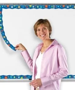 A woman holding onto a ruler in front of a whiteboard