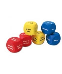 A set of six dice with words written on them.
