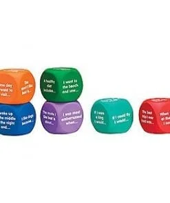 A set of six dice with different colors and words.