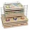 A stack of wooden puzzles with metal racks.