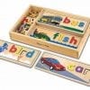 A wooden box with two sets of letters and vehicles.