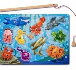 A magnetic fishing game with sea animals on it.