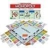 A monopoly board game with the pieces laid out.