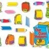 A bunch of different school supplies that are on the floor