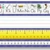 A ruler and a pencil with the letters k, l, m, n, o, p, q, u, v, w ,