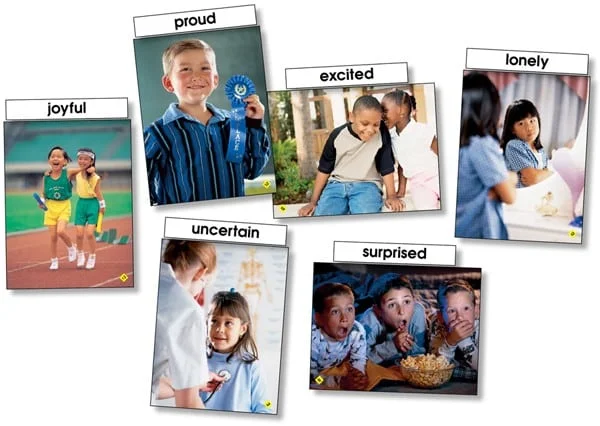A group of children with different expressions on them.