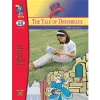 A girl reading in front of a castle.