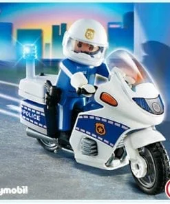 A playmobil police officer on a motorcycle.