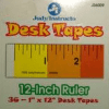 A box of desk tapes with the ruler on it.