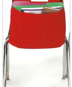A red chair with a book pocket on the back.