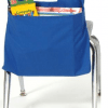A blue bag is on the back of a chair.
