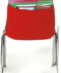 A red chair with a bag of books in it.