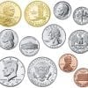 A group of coins that are in different shapes and sizes.