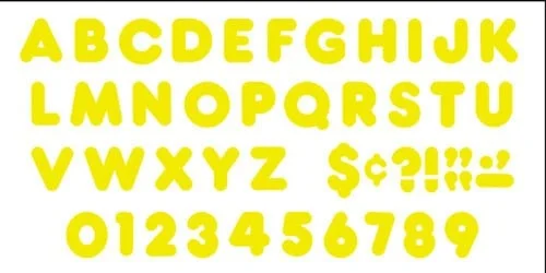 A yellow alphabet and numbers set with a price tag.