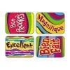 A set of four colorful coasters with different designs.