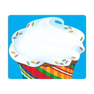 A cupcake with white frosting and sprinkles on top.